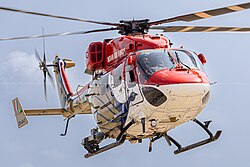 A solo HAL Dhruv Mk.1 of the Sarang Helicopter Display team coming in for landing after a display.
