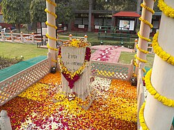Memorial at the location of Gandhi's assassination in 1948. His stylised footsteps lead to the memorial.