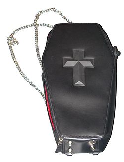 Common accessory worn by members of dark culture: a backpack in the shape of a coffin