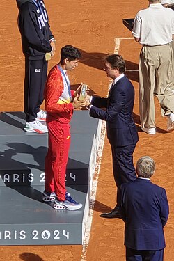 Alcaraz receiving his silver medal following the men's singles final at the 2024 Summer Olympics
