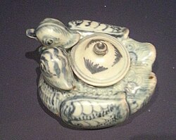 A Yuan dynasty porcelain teapot representing a mandarin duck pair
