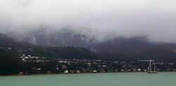 A view of Douglas Island from mainland Juneau. The Juneau-Douglas Bridge connects the island to the mainland.