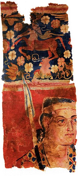 Soldier with a centaur in the Sampul tapestry,[60] wool wall hanging, 3rd–2nd century BCE, Xinjiang Museum, Urumqi, Xinjiang, China.