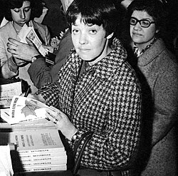 Walsh signing copies of her books, 1962