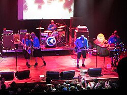 The departure of Adam Deibert in 2004 left The Aquabats a five-piece, effectively changing the band's sound and setting the stage for their career rejuvenation with Charge!!.