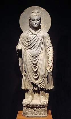 One of the first representations of the Buddha, and an example of Greco-Buddhist art, 1st-2nd century AD, Gandhara: Standing Buddha (Tokyo National Museum)
