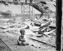 Infant crying in Shanghai's South Station after the Japanese bombing, August 28, 1937