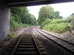 A partially restored double-track section south of Wymondham Abbey, England, on the Mid-Norfolk Railway