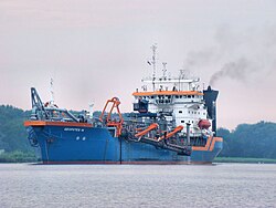 The Geopotes 14 lifting its boom on a canal in The Netherlands. (gēopotēs is Greek for "that which drinks earth")