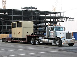A double dropdeck flatbed trailer