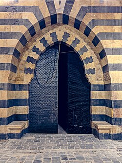 Gate of the souq Khan al-Harir after its reconstruction in 2020