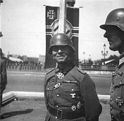 Rommel at a Paris victory parade (June 1940). Rommel had access to Reich Minister of Propaganda Joseph Goebbels via senior propaganda official Karl Hanke, who served under Rommel during the 1940 campaign.[453]