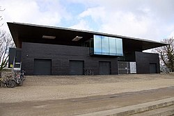 The University College Boathouse, opened in 2007 during Robin Butler's Mastership of University College, Oxford