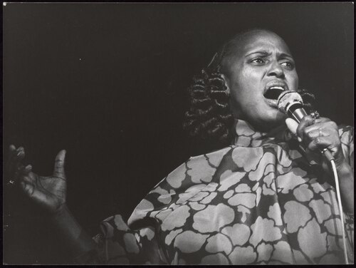 A black and white image of Miriam Makeba performing in 1978