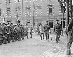 Haig attending a service on the fourth anniversary of the declaration of war at Montreuil, France, 4 August 1918. Stood to his left is Lieutenant General Fowke, the BEF's adjutant general, while his CGS, Lieutenant General Lawrence, Kiggell's successor, is on his right.