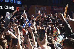 Senator Chuck Schumer addresses a crowd celebrating in Times Square, New York City, shortly after the election was called for Biden.