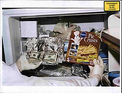 This photo of cash found in Congressman William J. Jefferson's freezer in the August 2005 raid was shown to jurors on 8 July 2009.