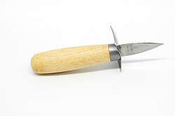 Special knives for opening live oysters, such as this one, have short and stout blades.