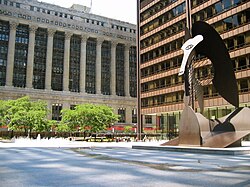 Daley Plaza and the Chicago Picasso, with City Hall-County Building visible in background. At right, the Daley Center contains the state law courts.