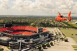 A U.S. Coast Guard MH-65 Dolphin helicopter flying over the stadium in August 2011