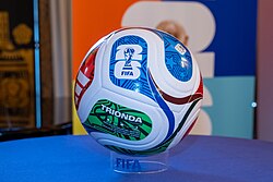 The match ball displayed on a stand.