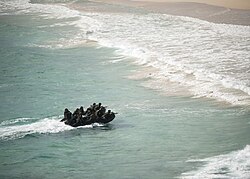 Marines in an amphibious beach assault exercise during RIMPAC