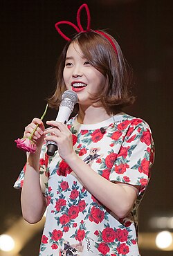 IU at a Modern Times concert in Busan, South Korea, on December 1, 2013