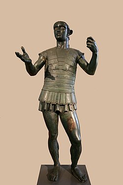 The Mars of Todi, a life-sized Etruscan bronze sculpture of a soldier making a votive offering, most likely to Laran, the Etruscan god of war, late 5th to early 4th century BC