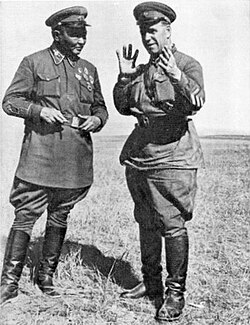 Khorloogiin Choibalsan, leader of the Mongolian People's Republic (left), and Georgy Zhukov consult during the Battle of Khalkhin Gol against Japanese troops, 1939