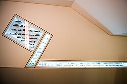 Figurines on display in a vitrine built into the Michael Lee-Chin Crystal