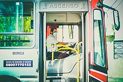 A bus driver with a face mask in Argentina.