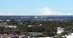 View across the Cumberland Plain, showing the extensive urban tree canopy that forms a prominent feature of the Greater Sydney landscape.