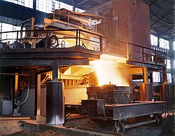 White-hot steel pouring out of an electric arc furnace in Brackenridge, Pennsylvania