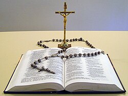Catholic religious objects – Holy Bible, crucifix and rosary