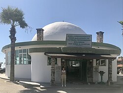 The Shrine of Khidr, located near the Syria-Turkey border, is a notable Alawite shrine frequently visited by people from multiple cities.[210]