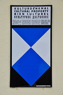 The Blue Shield mounted on the outside of a building in Austria