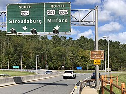 The north end of US 206 at US 209 in Dingman Township. US 206 is signed to follow US 209, but officially does not.