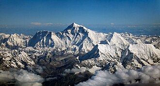 Fig. 13 Aerial photo of Mount Everest from the south, behind Nuptse and Lhotse