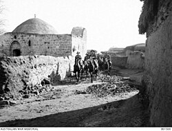 Entry to "New Deiran", the Jewish colony Rehovot, through the village of Zernukah; photo by Frank Hurley