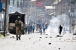 Indian police in Kashmir valley confronting violent protesters in December 2018