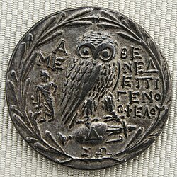 The owl of Athena, surrounded by an olive wreath. Reverse of an Athenian silver tetradrachm, c. 175 BC