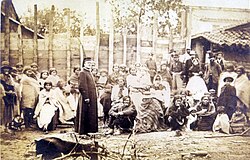A Brazilian priest with Paraguayan refugees coming from San Pedro, 1869 or 1870