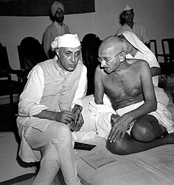 Gandhi talking with Jawaharlal Nehru, his designated political heir, during the drafting of the Quit India Resolution in Bombay, August 1942