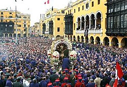 Peruvians participating in the annual procession in commemoration of the Lord of Miracles
