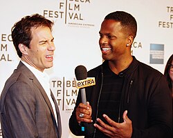 Entertainment reporter A. J. Calloway interviewing Eric McCormack at the 2012 Tribeca Film Festival premiere of Knife Fight