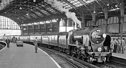Steam engine no. 30925 Cheltenham departing from the station, 1962
