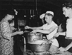 Eleanor Roosevelt visiting U.S. servicemen at Beta Base (Seymour Airport) on Baltra during World War II[58]