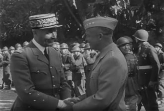 Eisenhower (right) after having been awarded the Légion d'honneur by French Civil and Military Commander-in-Chief Henri Giraud (left), May 1943