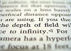 Text on a page that is partially in focus, but mostly not in varying degrees