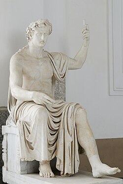 Augustus holds a scroll in his left hand.